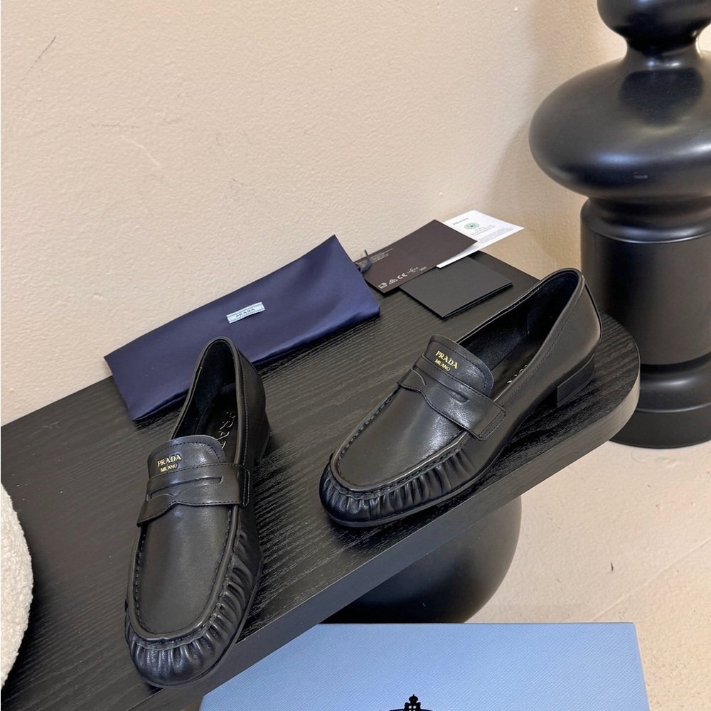 Prada Black Leather Loafers with Gold Accent - Picture 2 of 6